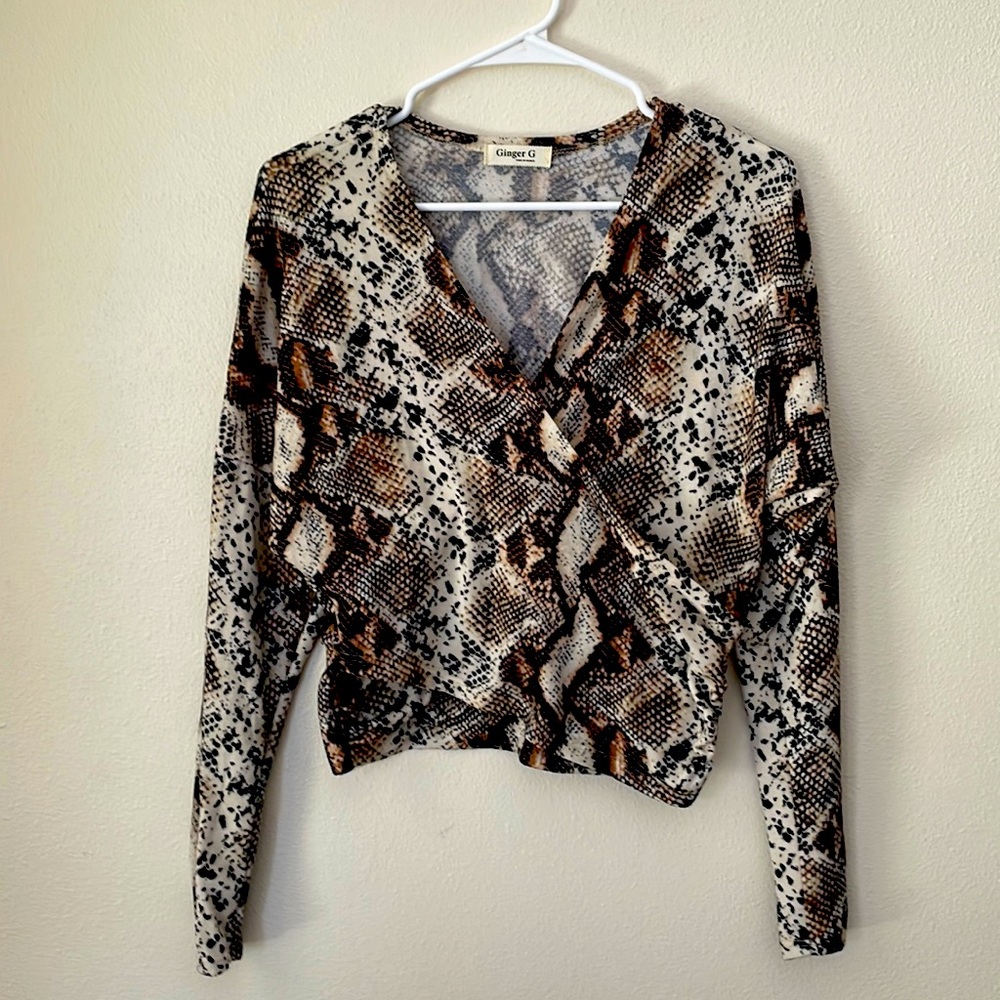 Snake skin pattern, v cut, long sleeve.